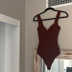 Dark mauve maroon knit bodysuit with sweetheart neckline